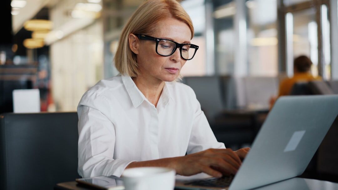 professional woman sending email