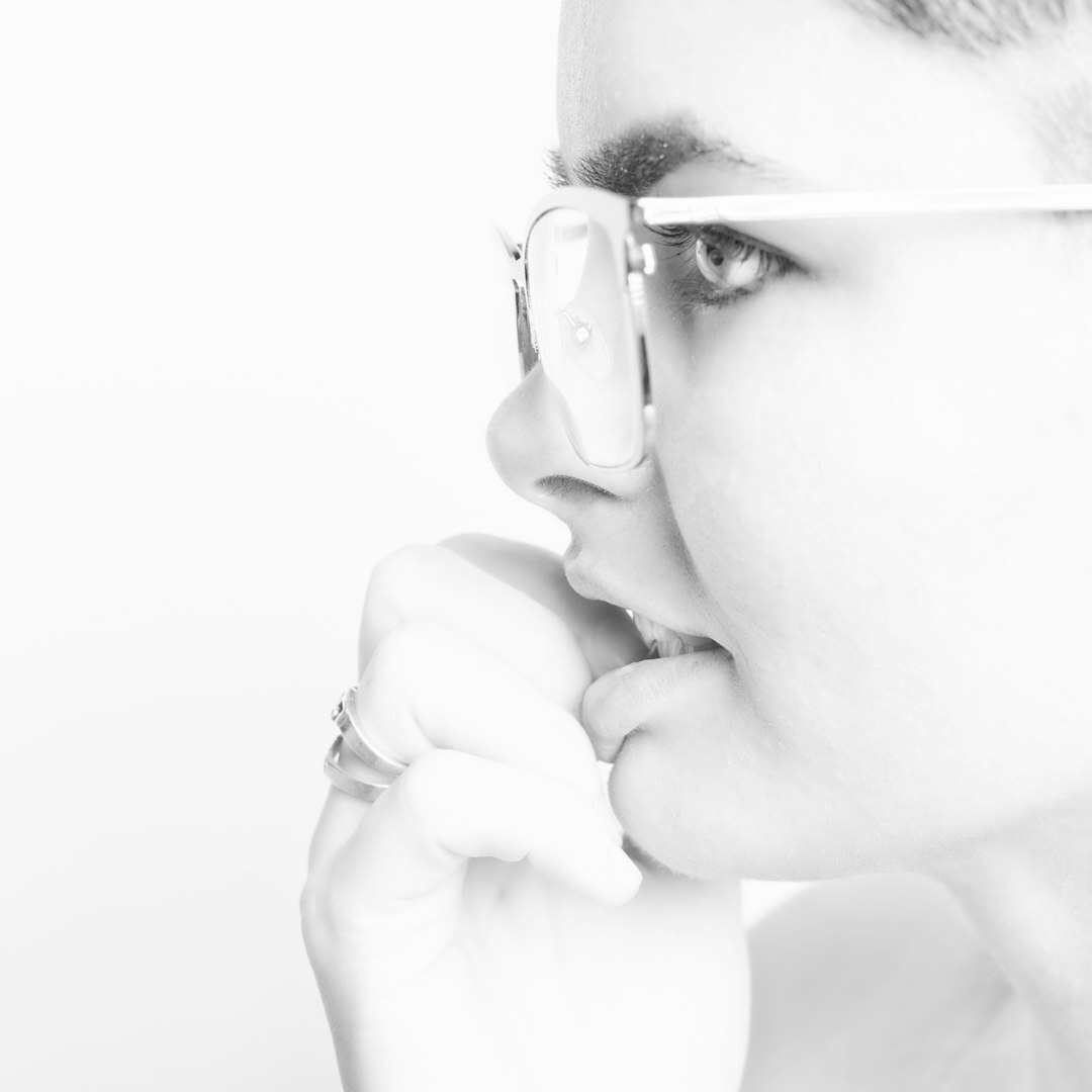 Portrait of a young Flemish businesswoman with glasses