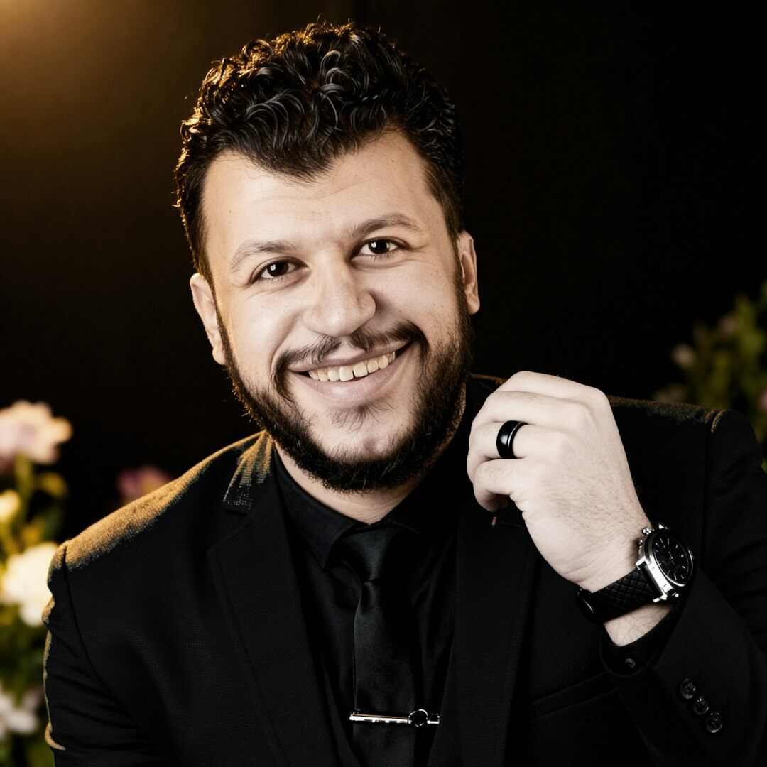 Portrait of a man of North African descent in a business suit
