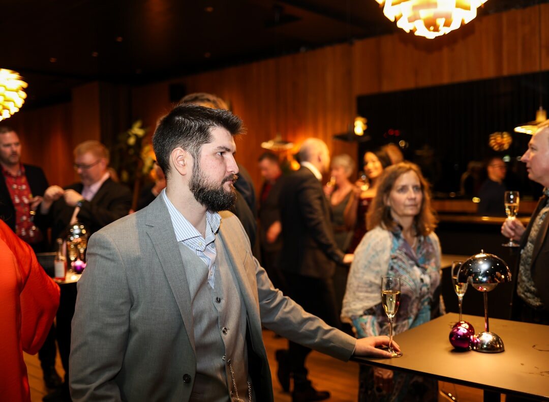 business professionals networking at event